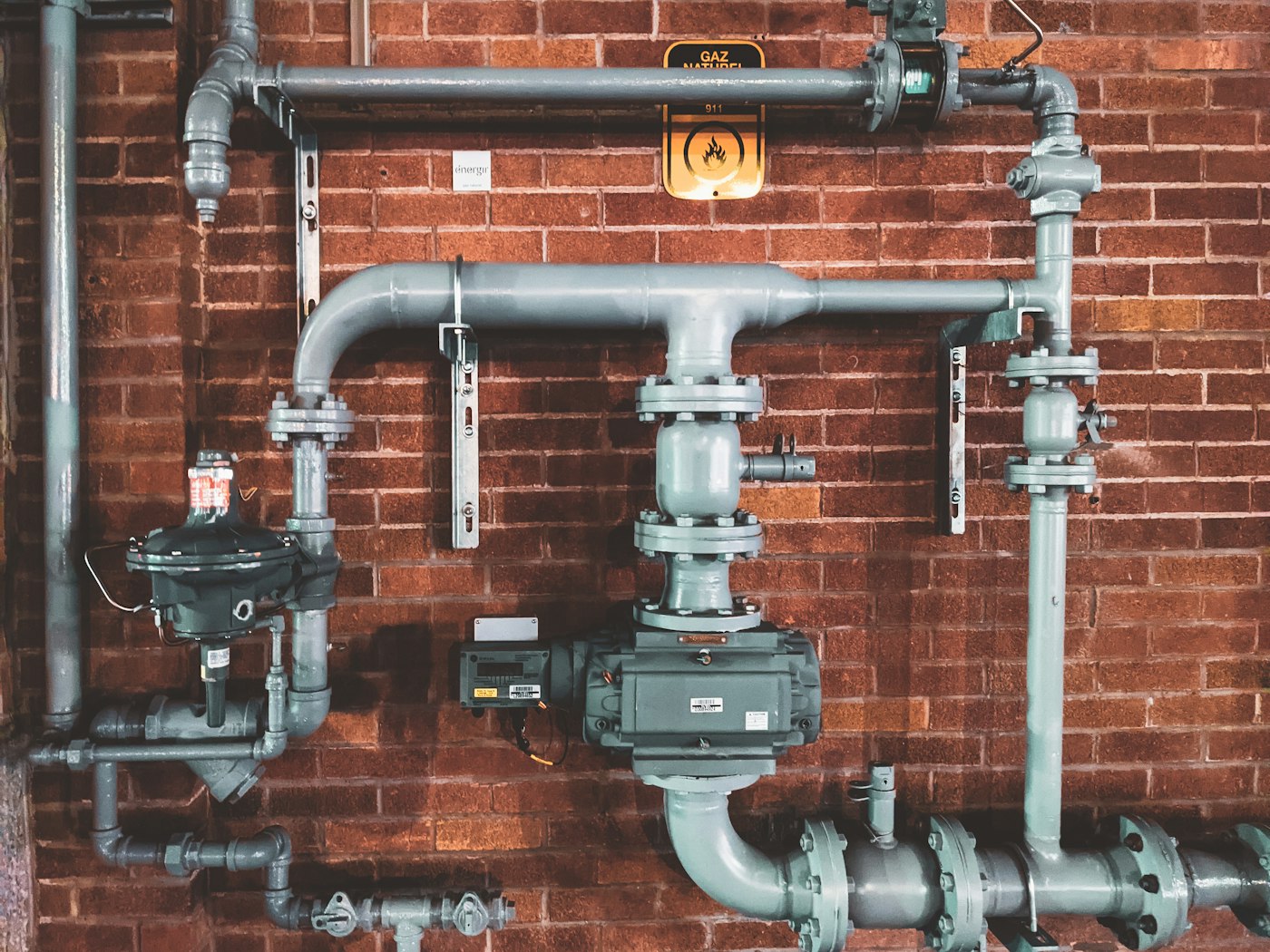 New copper pipes and valves installed in a building